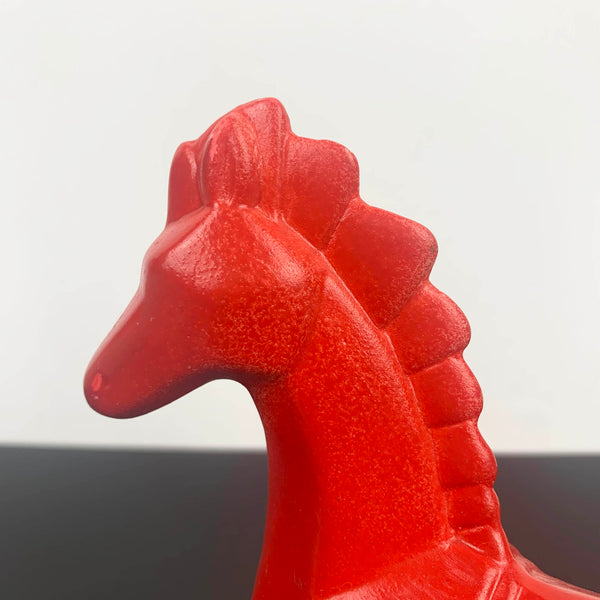 Red ceramic horse figurine