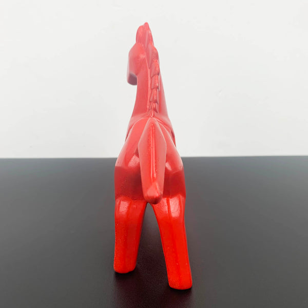 Red ceramic horse figurine