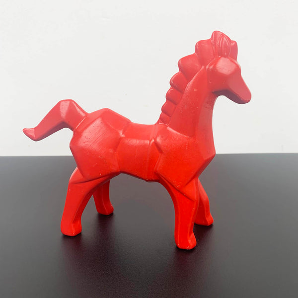 Red ceramic horse figurine