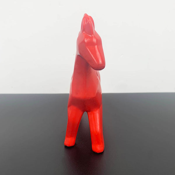 Red ceramic horse figurine