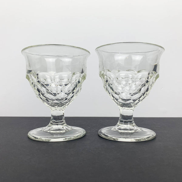 Pair of unique scalloped glass footed bowls