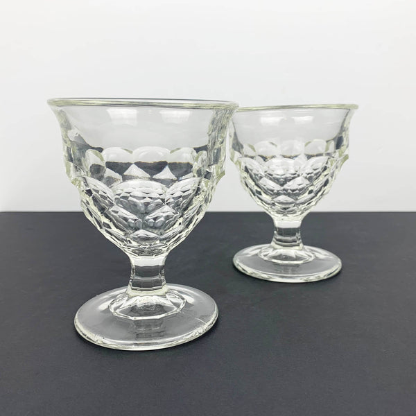 Pair of unique scalloped glass wine goblets