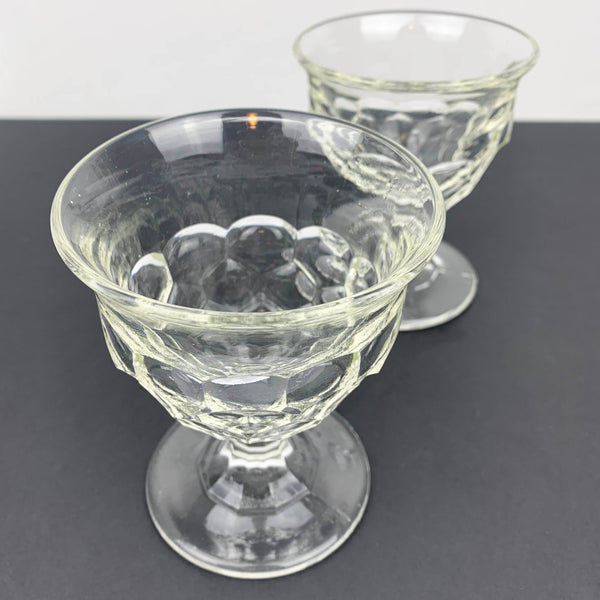 Pair of unique scalloped glass footed bowls top view