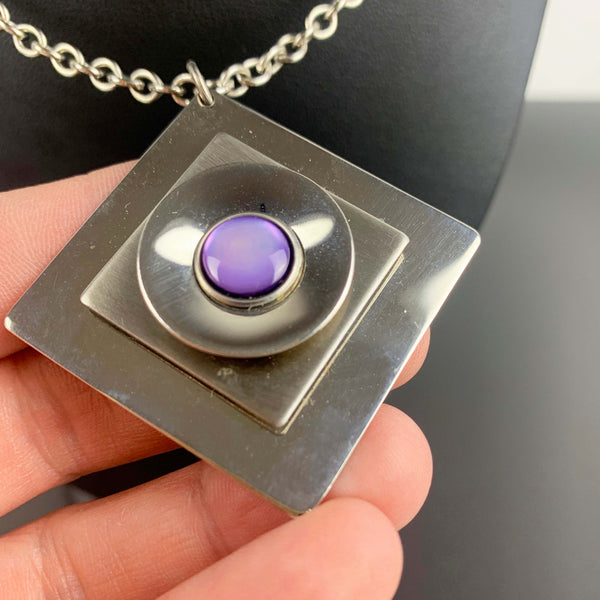 Retro bold steel diamond-shaped pendant with purple stone