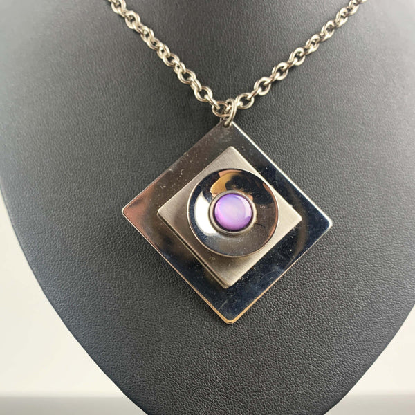 Retro bold steel diamond-shaped pendant with purple stone