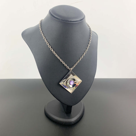 Retro bold steel pendant with purple stone