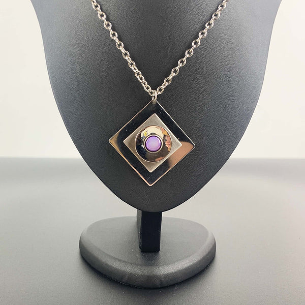 Retro bold steel diamond-shaped pendant with purple stone