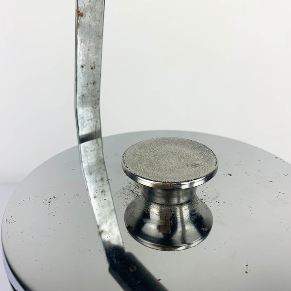 Vintage ice bucket showing wear to silver finish