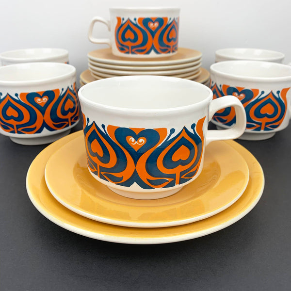 1970's cup and saucer with orange and teal pattern