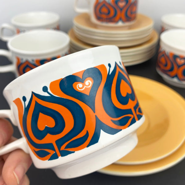 Retro orange and teal flower pattern cup