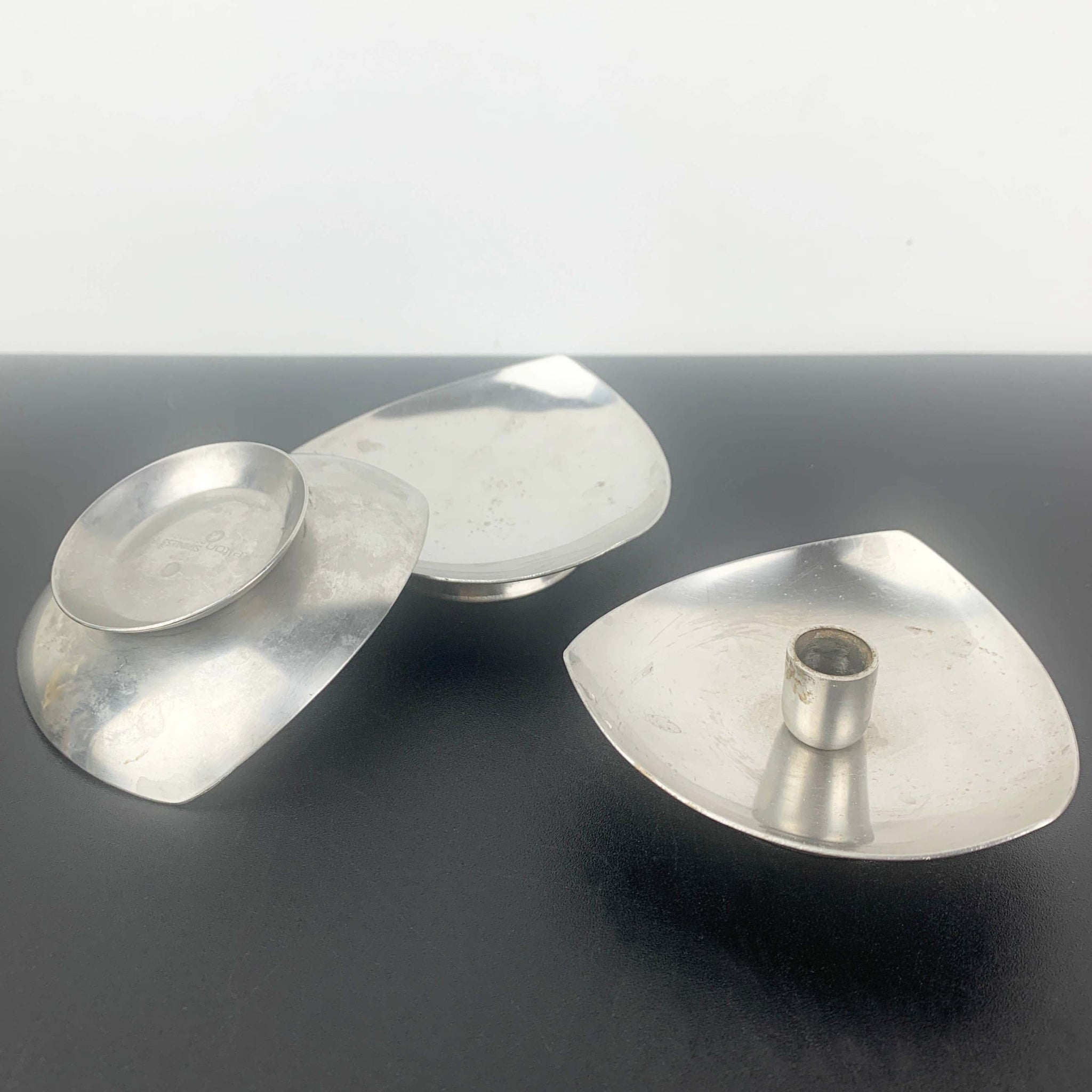 Arne Jacobsen design stainless steel triangle candle holders