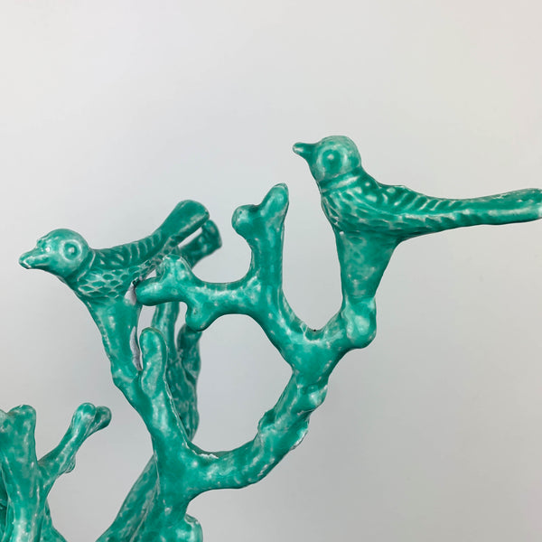 Teal metal branches and birds sculpture