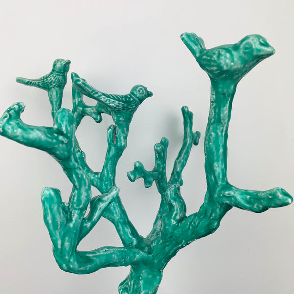 Teal metal branches and birds sculpture