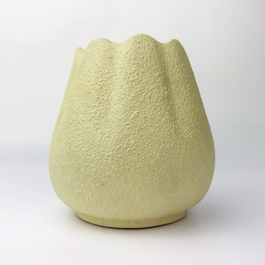 Pale yellow tulip shape textured pottery vase