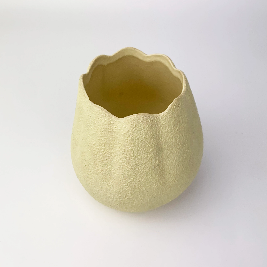 Tulip shape textured pottery succulent planter in pale yellow