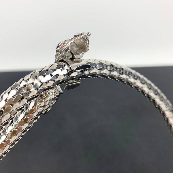 Whiting & Davis silver mesh snake belt showing snake head clip