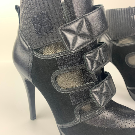 Velcro closure straps on biker style ankle boot