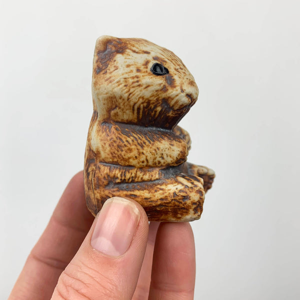 Miniature wombat pottery figurine hand held