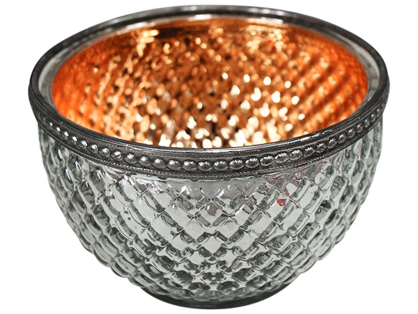 Decorative silver bowl with orange interior