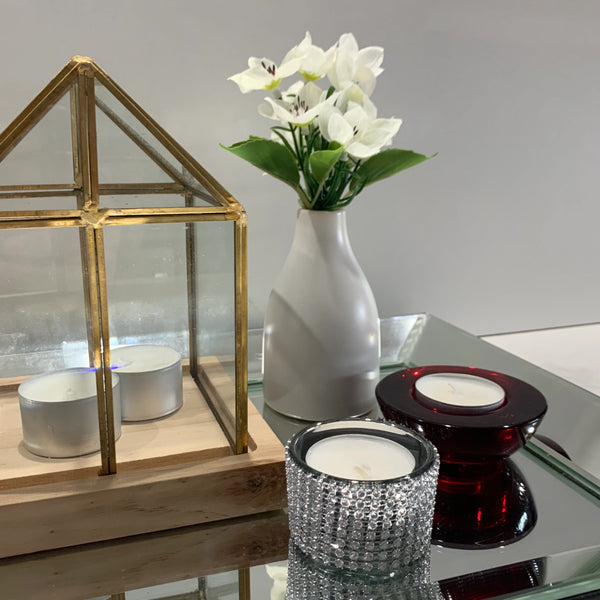 Tea light candle display with decorative holders